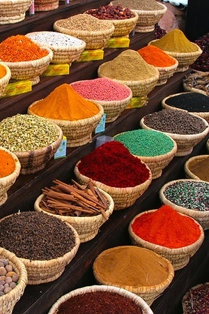 Variety of fresh and colourful spices in a store for cooking and recipes